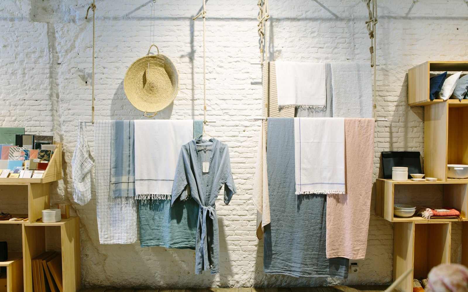 Inside the Brackish Goods shop — shelves of homewares in warm light